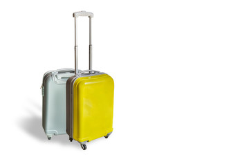 Yellow and grey travel suitcases isolated on white background