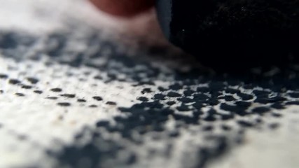 Macro shot of blue pastel dragged across textured paper - Powered by Adobe