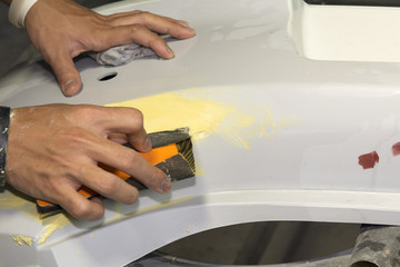 Working sanding primer before painting