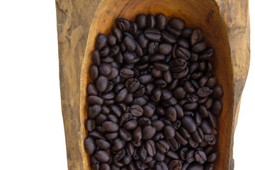 coffee beans in a wooden bowls, close up, horizontal