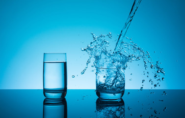 Сreative splashing water in the glass