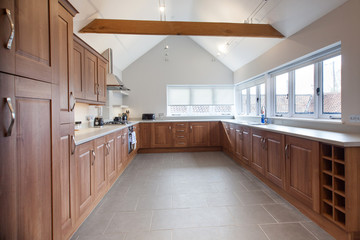 cozy bright kitchen interior with wooden furniture