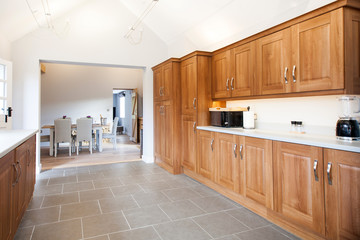 cozy bright kitchen interior with wooden furniture