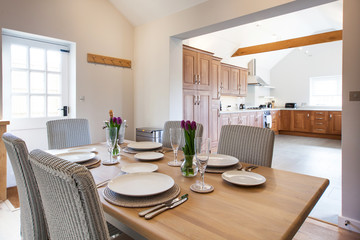 table setting with tulips in bright kitchen