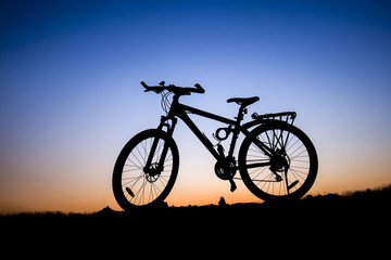 Fototapeta na wymiar The silhouette of mountain bike