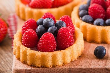 Tartlets with forest fruits. 