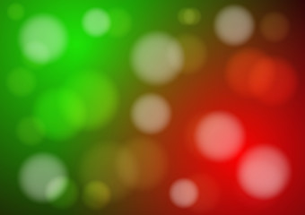 Obraz premium abstract green and red light bokeh background for christmas. vector