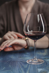 Female Having lunch with red wine in a cafe or restaurant.
