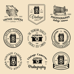 Vector set of old cameras logos. Vintage photo studio, salon signs, labels or badges.