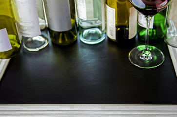 Drinks / wine / food blackboard background, fading to blur.