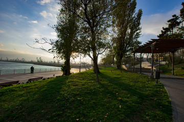Alley park and Black Sea shore at sunset in a cold day