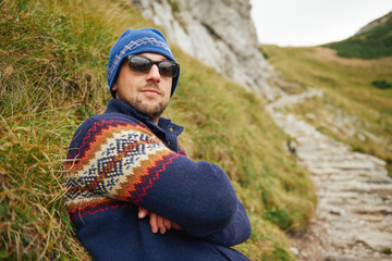 Hiker looking cool on a rugged mountain trail