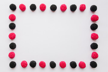 Frame of candy or jelly on white background