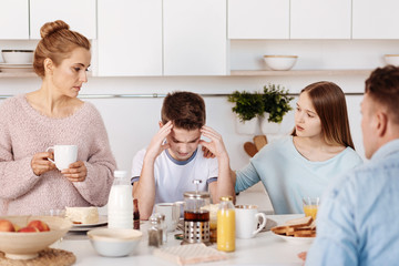 Caring sister supporting her younger brother