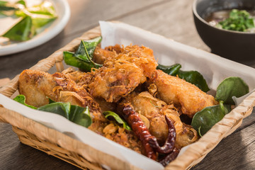 Fried chicken with herb in basket