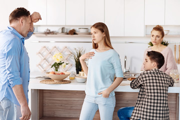 Serious father and daughter quarrelling