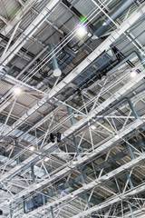 Fototapeta premium Structure of the metal ceiling of a building, roof or room