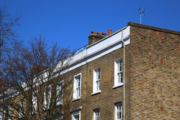 Fototapeta na wymiar Modern stone facade on a sunny day