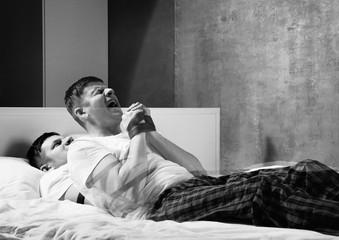 Young man suffering from sleep paralysis