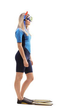 Woman with a swimsuit and snorkeling equipment