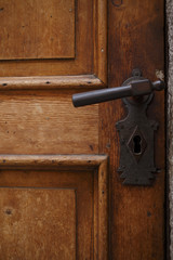 Old wooden door with rusty handle Architecture