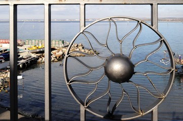 Fragment metal fencing of seaport along embankment  in resort town Anapa, Russia