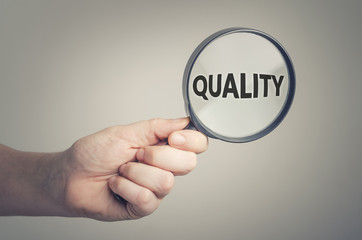 Looking for quality. Conceptual image of quality control.