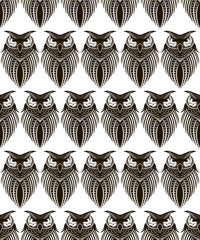 Seamless pattern with black owls on a white background