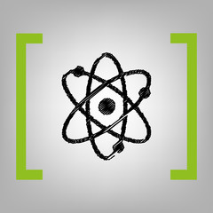 Atom sign illustration. Vector. Black scribble icon in citron brackets on grayish background.