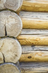 Wall of the rural house made from wooden logs. Wooden background. 