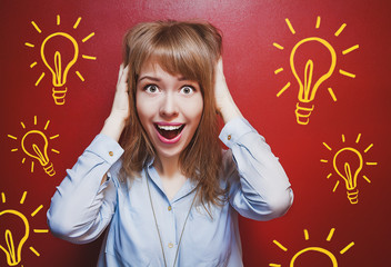 Woman surprised on a red background