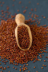red quinoa on dark background
