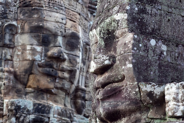Fototapeta na wymiar Giant stone faces at Prasat Bayon Temple, Cambodia