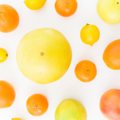 Fruit pattern. Lemon, orange, mandarin, grapefruit and sweetie on white background. Flat lay, top view.
