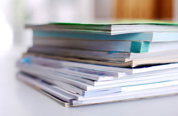 Group of multicolored office folders and glasses