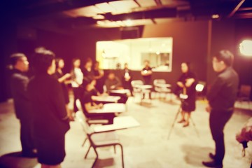 blurred image of Business People Colleagues Teamwork Meeting for planning Seminar Conference Concept. vintage filter.