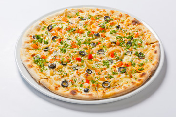 fast food. vegetarian pizza with vegetables on a white plate