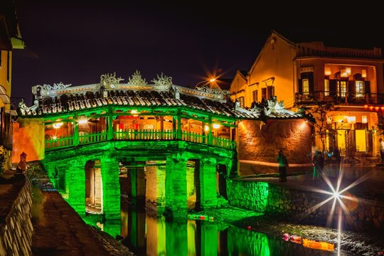 HOI AN, VIETNAM - MARCH 15, 2017: The Japanese coverage bridge at night - Hoi AN Vietnam. This bridge connected the Japanese section of the old town of Hoi An and was built in 1590.