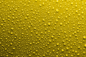 Water drops on yellow
