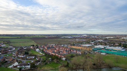Aerial view of a lake and river area in the countryside late afternoon in the winter
