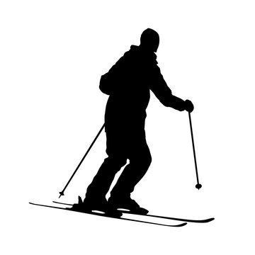 silhouette of skiing man.