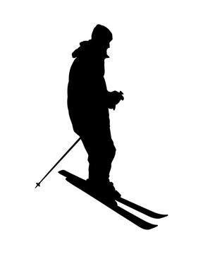 Silhouette of man on alpine skiing