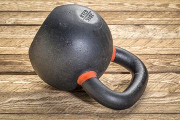 Naklejka na ściany i meble heavy iron kettlebell - fitness concept