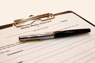 The form of the contract with a pen on a white background