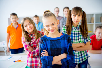 Happy students in classroom