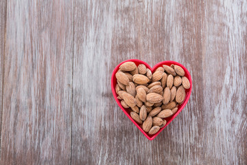 Almonds In Red Heart Shaped Bowl