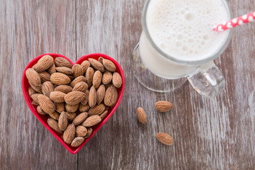 Almonds In Heart Shaped Bowl With Almond Milk