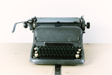 Fototapeta na wymiar Vintage typewriter on a table