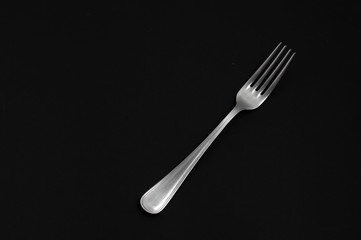 fork on a black background