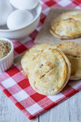 Autumn Apple Hand Pies with Raw Sugar and Eggs Vertical